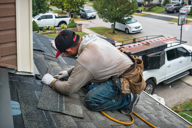 Professional Roof Repair technician working in Pembroke, MA